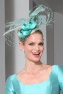 Serre-tête avec calotte à plumes et nœud turquoises pour mariage